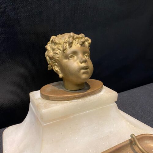 altın kaplama kafa heykeli